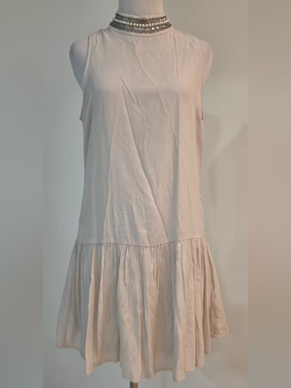 Womens Sleeveless Ruffle-Hem Dress in Light Blush